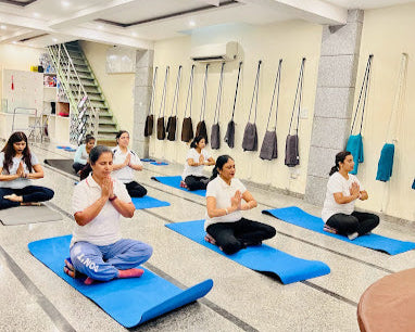 Students practicing yoga